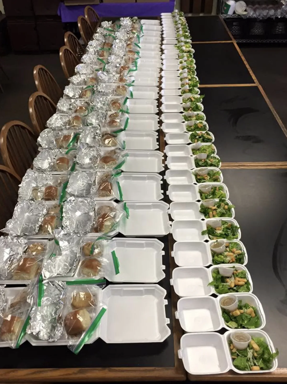 Custom boxed lunches, packed and labeled for a visiting team